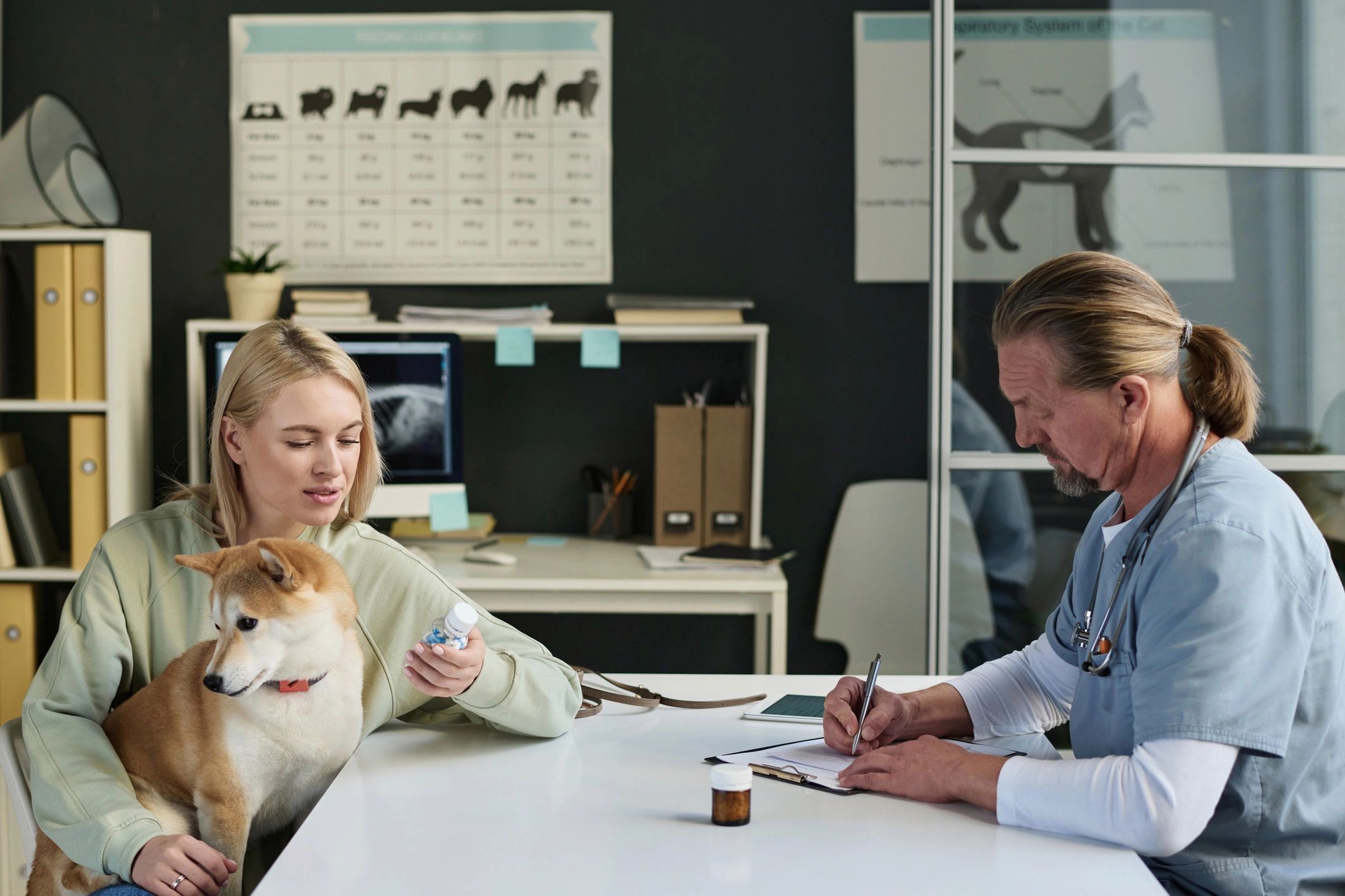 Research-focused consultation scene with pet owner and veterinarian