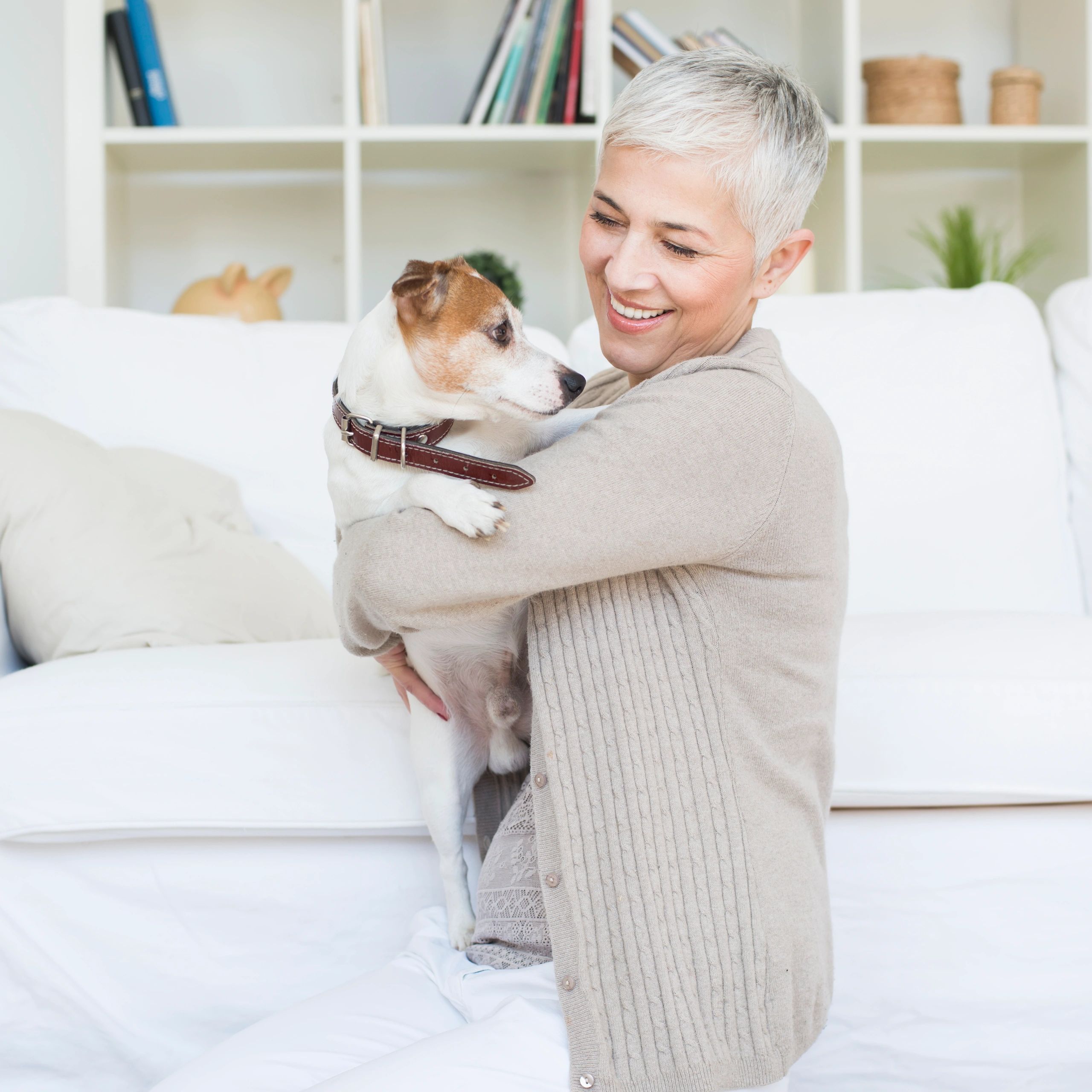 Woman with her pet at home